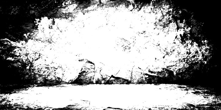 An abstract black and white grunge background featuring a dirty ink splat pattern with an artistic paint splatter border and a floral vector design illustration