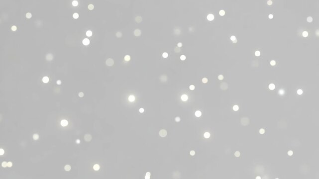 Soft glowing bokeh lights scattered on a grey backdrop, minimal style, concept of elegance and calmness and serene mood