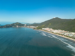 Obraz premium Sunny morning aerial drone view of Praia Grande beach in Ubatuba, Brazil