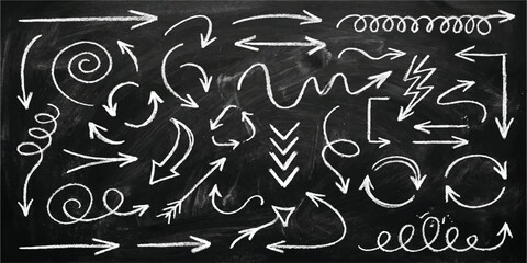 Obraz premium Set of hand drawn chalk arrows and doodle elements on a black chalkboard background Vector, illustration
