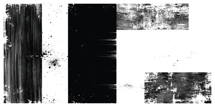 Abstract black paint brush strokes and grunge texture rectangles on a plain surface