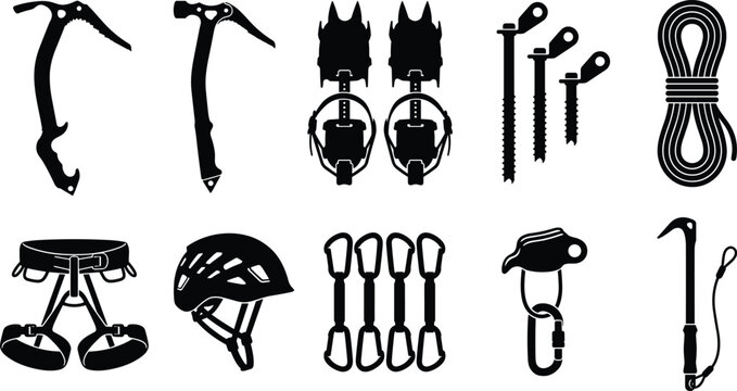 Climbing equipment laid out on a surface including ropes and carabiners.