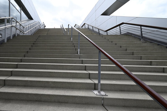 Wide shot of stairway with handrail. Details of stairways at Altona Cruise Center.