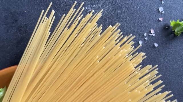 Spaghetti raw durum wheat food preparation lunch or dinner tasty snack fresh, delicious, gourmet food, background on the table, rustic food, top view farm product copy space