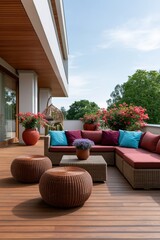 Fototapeta premium Modern outdoor terrace seating with wicker sectional sofa and colorful cushions for balcony background and patio design