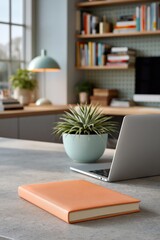 Fototapeta premium Laptop and plant beside notebook on home desk near window