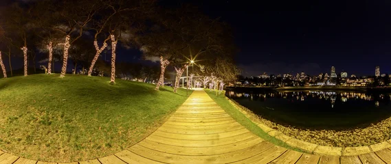 Night Boardwalk With Holiday Tree Lights and City Skyline in Downtown Vancouver, British Columbia, Canada © edb3_16