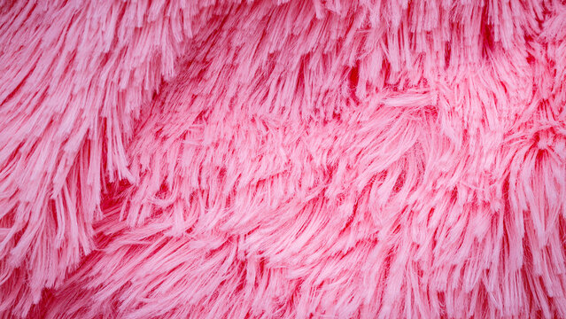Fluffy pink fabric close up showing texture and softness in a casual setting