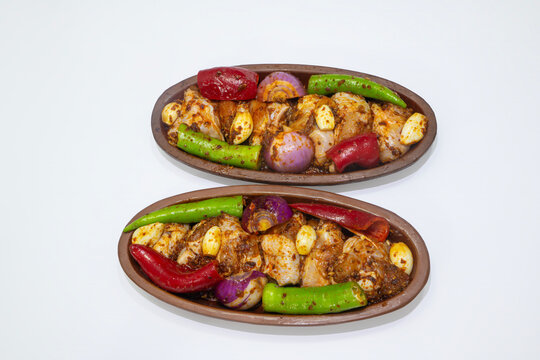 The indispensable accompaniment to kebabs and meat dishes: sumac onion salad. Photographic work on white oath