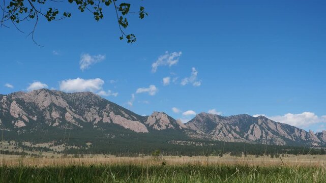 Flatirons and Prairie Landscape at South Boulder Creek West Trail in Late Spring, Boulder Colorado, 4K Video