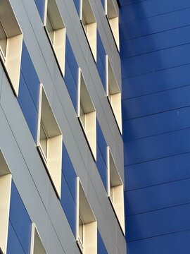modern office building, White and blue building, many windows