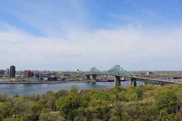 Fototapeta premium Jacques Cartier Bridge over Saint Lawrence River Montreal Quebec Canada spring