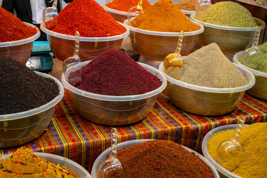 Mounds of Vibrant Spices at an Outdoor Antalya, Urfa, Gaziantep, Hatay Street Market . Various bright colored powder spices on market in Istanbul, Turkey. Turkish  colored spices at old bazaar  market