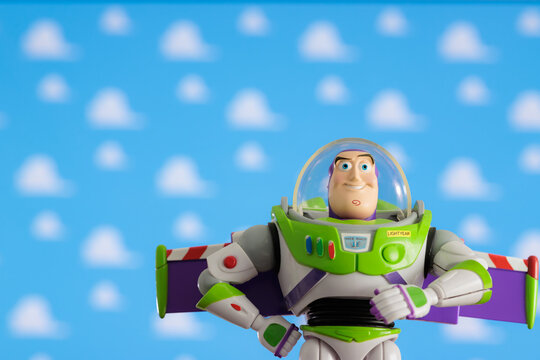 ISTANBUL, Turkiye - MAY 13 2026: Buzz Lightyear action figure character from the Toy Story movie Disney Pixar against TV background