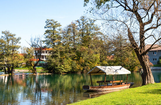 A tourist boat parked on the banks of the Una River in Bihac, a city in Bosnia and Herzegovina.