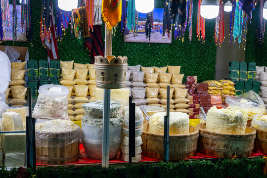 Various Turkish cheese on in diary production market. A lot of kind Turkish cheese  wheels on the shelves in diary production market. Food. Organic fresh chee se  skin and blocks of raw  in stainless 