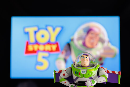 ISTANBUL, Turkiye - MAY 13 2026: Buzz Lightyear action figure character from the Toy Story movie Disney Pixar against TV background