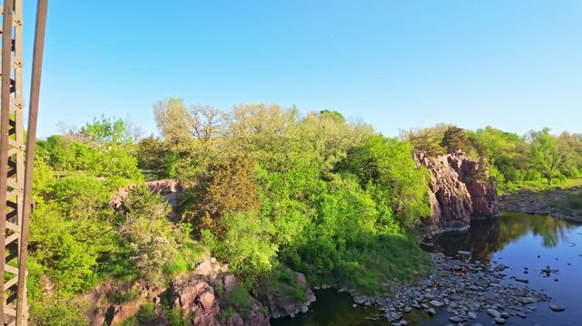 Scenic morning view of the historic 1908 Palisades Iron Bridge at Palisades State Park, South Dakota
