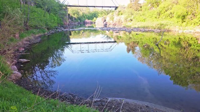 Scenic morning view of the historic 1908 Palisades Iron Bridge at Palisades State Park, South Dakota

