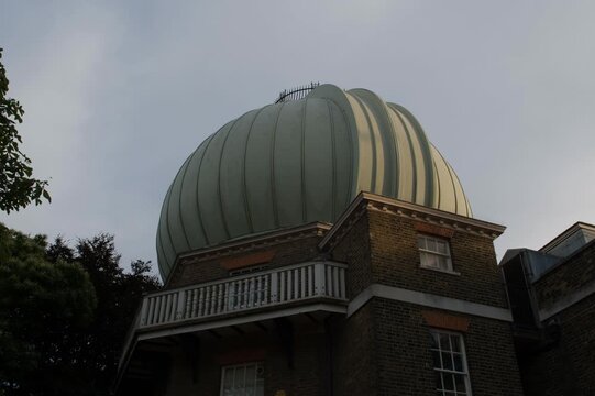 Royal Observatory Greenwich Timelapse Showing Historic Astronomy Dome, Brick Facade and Soft Sunset Light in London England