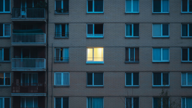 Apartment Building Facade With One Lit Window at Dusk completely xxshctrxmu9a69ci4oqa