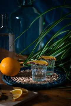 Mezcal shots with orange and sal de gusano