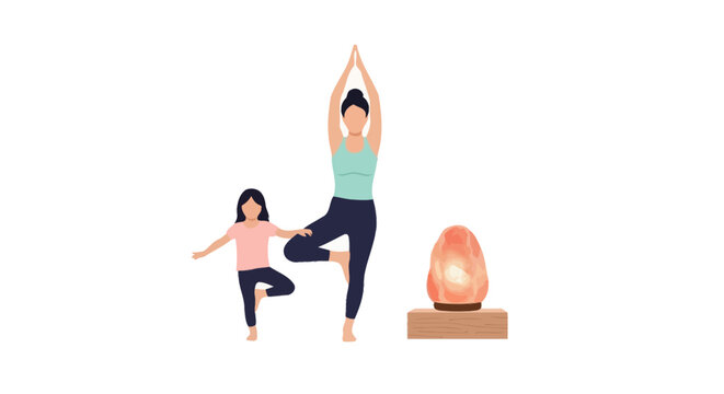 Mother and daughter practicing yoga with salt lamp nearby.