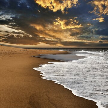 Waves on empty beach, dramatic cloudy sky at sunset, Race Point Beach, Cape Cod, Atlantic Coast, Massachusetts, New England, USA