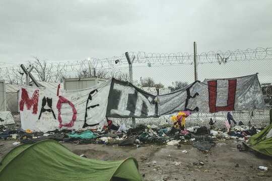 Transparent on the border fence Made in EU, refugee camp in Idomeni, border with Macedonia, Greece
