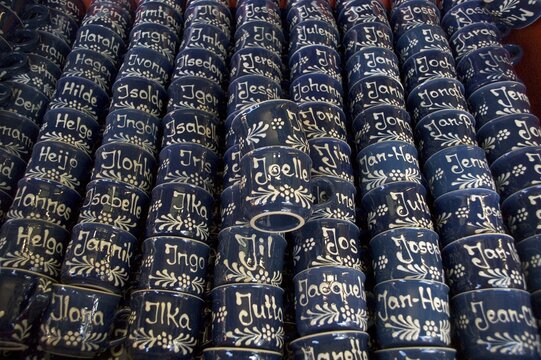 Personalised personalized mugs name names on the annual fair Auerdult in Munich Germany