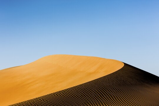 Shapes, structures and patterns, light and shadow on sand dunes, Rub' al Khali or Empty Quarter, United Arab Emirates