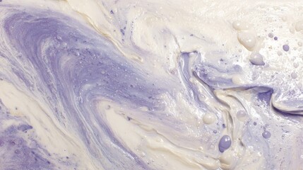Fototapeta premium Viscous mixture of pale purple and off white pigments swirling together creating abstract texture