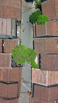 Aerial drone view of Hoi An city, Quang Nam province, Vietnam. Panoramic footage of Ancient town, UNESCO world heritage. One of the most travel popular touristic destinations
