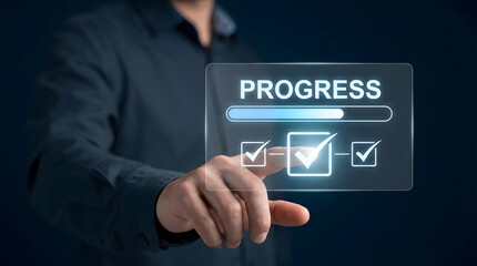 Obraz premium Businessman interacting with a digital progress bar and checklist on a transparent screen