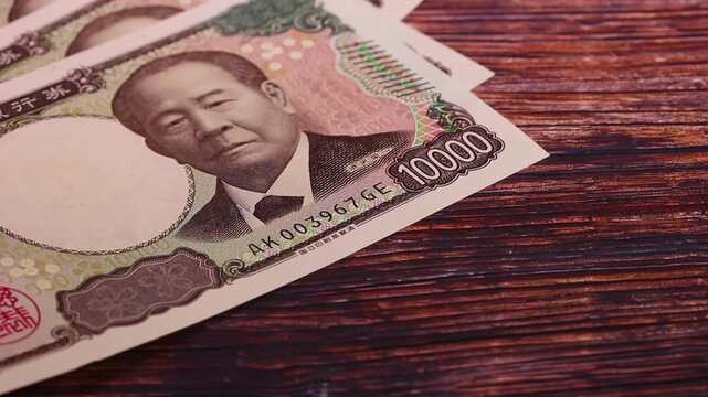 左側へスライドインして静止する日本円のキャッシュ