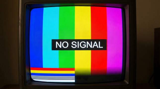 Old tv screen displaying no signal with colorful test pattern