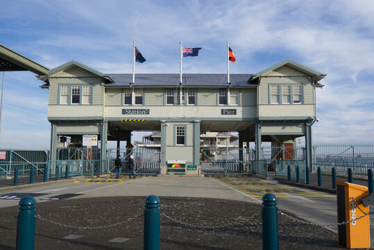 flags flying over Station Pier building, passenger shipping