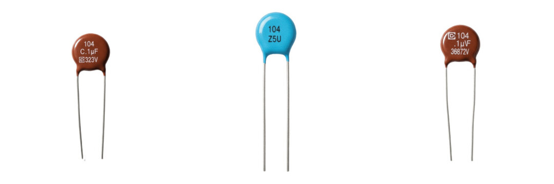 Ceramic capacitor electronic hardware component specimen showcasing solid state physical morphology traits, microelectronics electrical network topology parameters, architectural circuit schematics