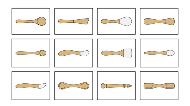 Set of twelve wooden bones arranged in a grid pattern
