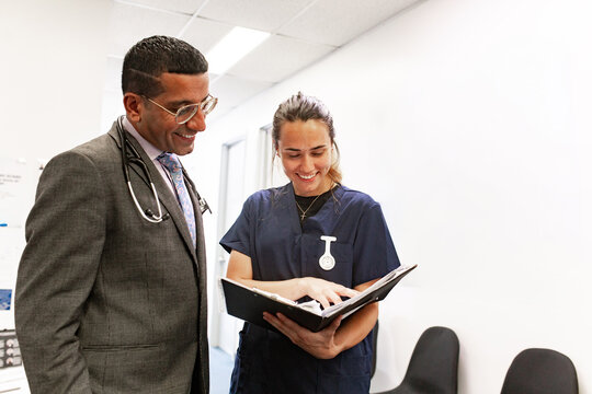Healthcare professionals collaborating in medical office