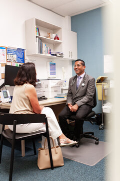 Healthcare provider discussing care with patient