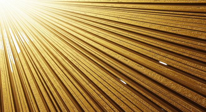 Golden rays streaming through textured parallel lines creating dynamic visual pattern