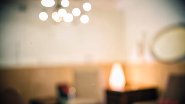 Creamy light diffusion over soft architectural surfaces in a warm luxury interior