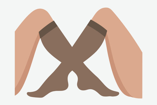 Crossed legs wearing brown compression stockings used for treating varicose veins or improving blood circulation in medical care.