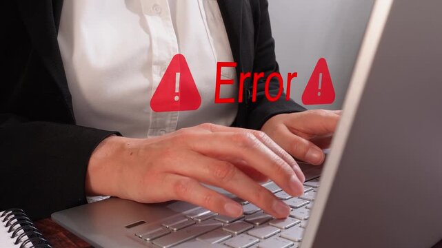 Detail of female hands typing on a laptop with an "Error" animation and warning signs. Warning message indicating a computer error.