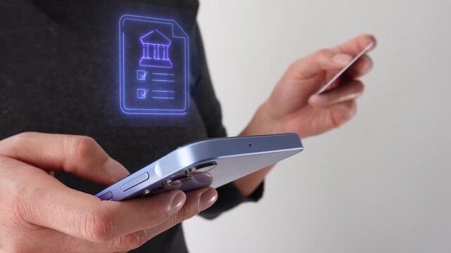 Businesswoman holding a bank card and a cell phone, with a virtual icon of a bank document.