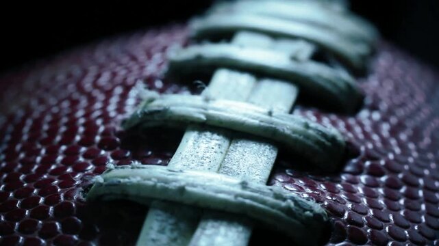 American Football Gridiron Close up Tracking Shot of Football flyover in 4K Ultra HD footage