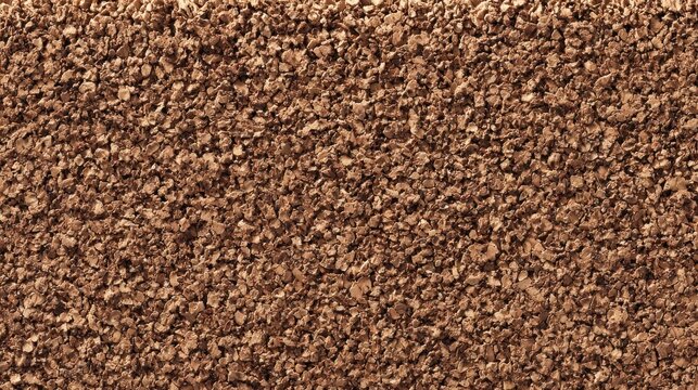 Granular cork material forms a uniform, richly textured background surface.