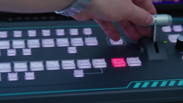 A right to left panorama view of zoom in camera angle on a controller. A digital controller with a green and red buttons in the middle and zooming control arm.