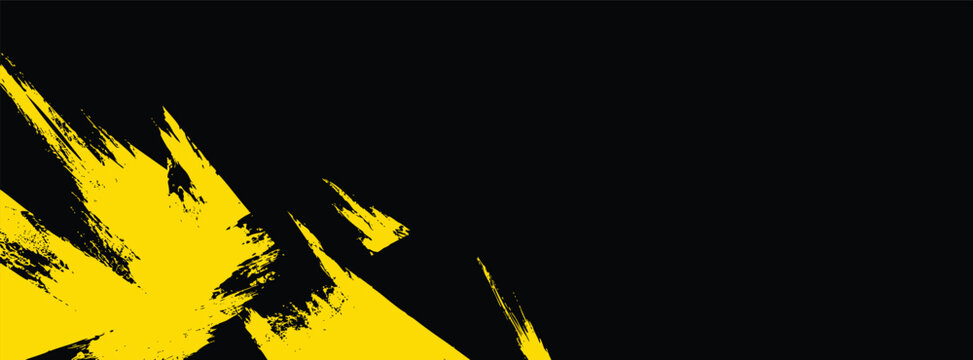 Abstract yellow brush stroke texture on black background